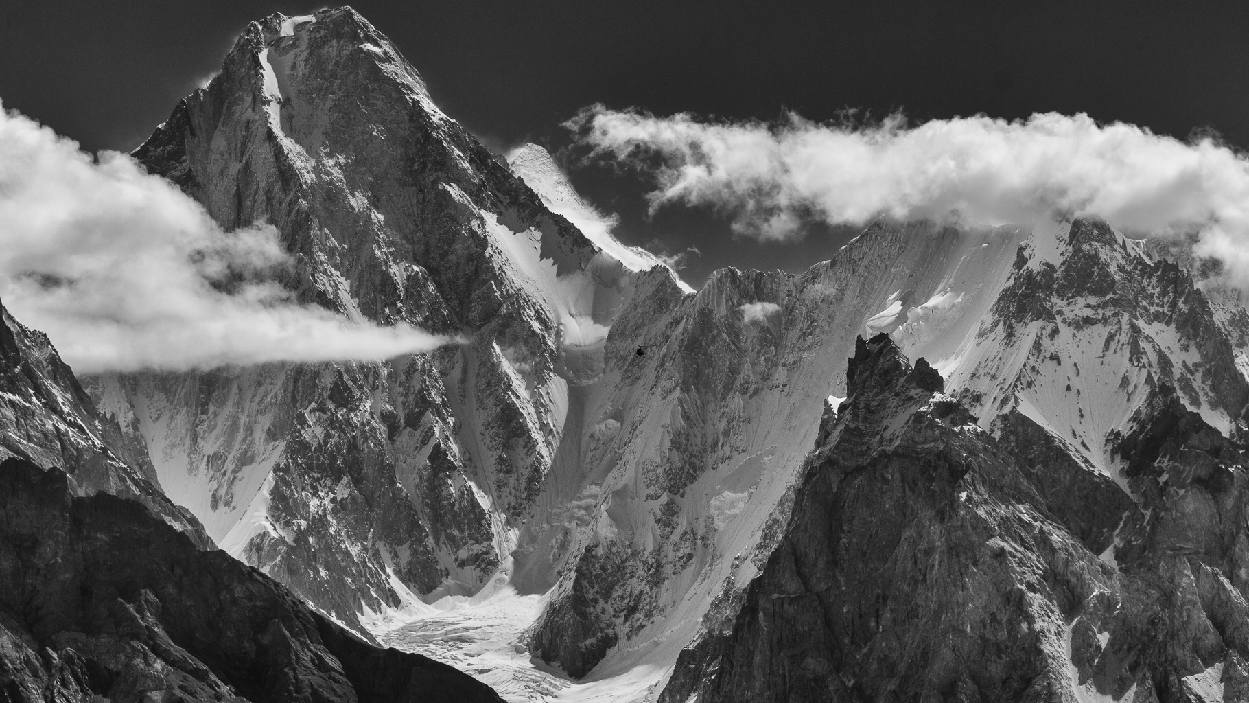 Gasherbrum IV 7925<br />Behind G II 8035<br />(with military helicopter)